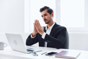 Man in office businessman sitting at desk and working in laptop, finance and startup concept,...