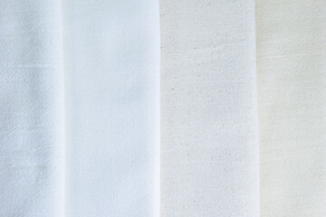 stack of white cotton clothes, textile fashion industry