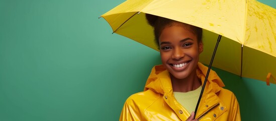 A happy woman with a yellow raincoat and yellow umbrella, smiling, enjoying leisurely travel under her bright headgear.