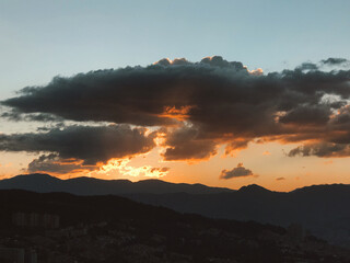 Sunset background with different textures and colors in the clouds. Medellin, Colombia. 