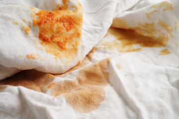 Dirty tomato sauce stain or ketchup on cloth to wash with washing powder, cleaning housework...