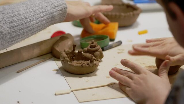 Kids work with Ceramics at Pottery Workshop