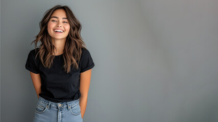 Hispanic young woman wear black t-shirt smile isolated on grey background