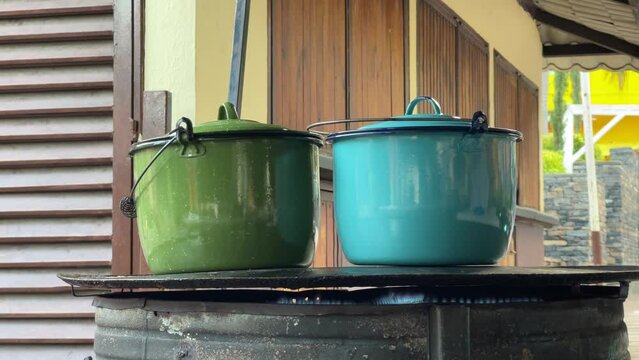 Two cooking pots of authentic mexican fast food