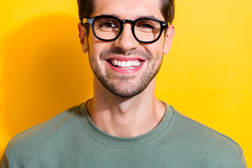 Cropped photo of funky cheerful guy wear khaki t-shirt spectacles smiling white teeth isolated...