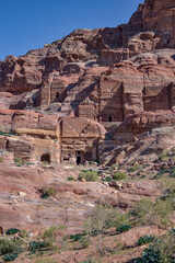 Ancient tombs carved into the rock in the city of Petra, Wadi Musa, Jordan.