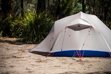 camper trailer tent set up camping in a park in the forest on a hoilday in australia