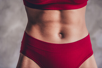 Studio cropped photo of skinny sporty lady dressed lingerie enjoy six packs tummy isolated no...