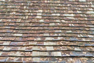 Vintage Brick Roof Tiles Texture on Old House Wall