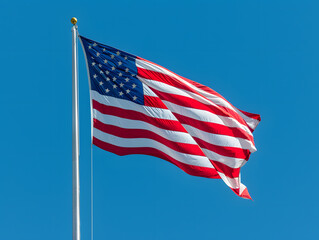 American flag waving proudly against a blue sky with stars and stripes, symbolizing freedom and patriotism in the United States