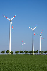 Wind turbines and trees seen in rural Germany