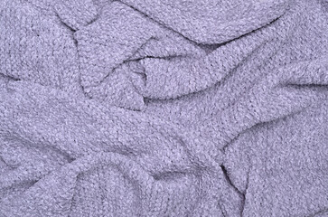 Gray knitted yarn background.