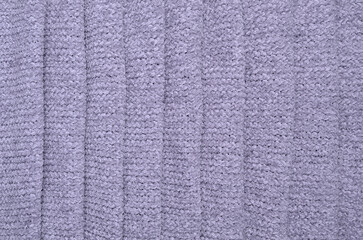 Gray knitted yarn background.