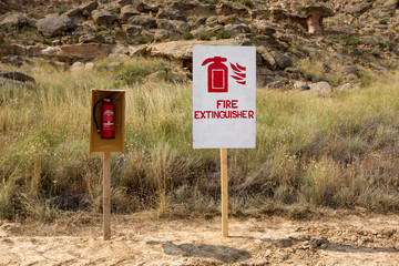 Nature fire safety sign and fire extinguisher