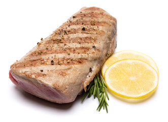 grilled cooked piece of tuna fillet isolated on white background