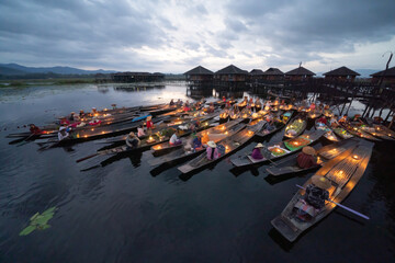 Damnoen Saduak Floating Market or Amphawa. Local people sell fruits, traditional food on boats in canal, Ratchaburi District, Thailand. Famous Asian tourist attraction destination. Festival in Asia. © tampatra