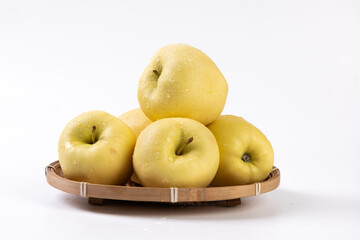 fresh yellow apples isolated on white background.