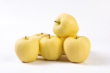 fresh yellow apples isolated on white background.