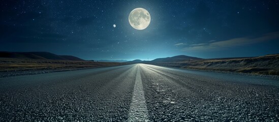 Traversing a vacant asphalt road under the bright full moon.
