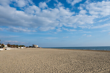 View on sandy beach of Terracina, Tyrrhenian Sea bay, ancient Italian city in province Latina, Italy