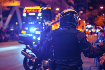 Back View Of A Traffic Police Motorcyclist In The City At Night With Siren Lights. Concept Of Road...