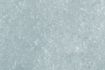 氷のシャーベット状になった雪面の冷たいテクスチャー