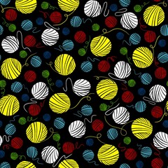 Seamless pattern featuring randomly scattered multicolored balls of thread on a black background.