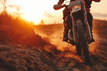 Motorcycle, jump, and adventure during a race, serving as transportation at sunset. Men, motorbike, and action for sports