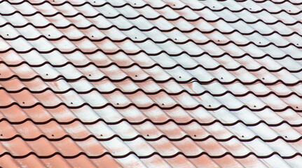 Metal tiles on the roof as an abstract background. Texture