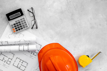 House design drawing blueprints with hard hat. Construction engineering and architectural project