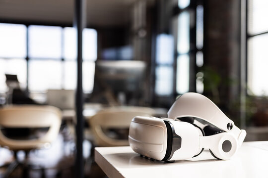 A virtual reality headset, indicative of casual business and cutting-edge technology integration, re