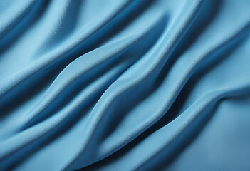 Obraz premium Abstract smooth elegant blue fabric silk texture soft background, flowing satin waves.