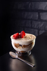 Tiramisu dessert in a glass bowl