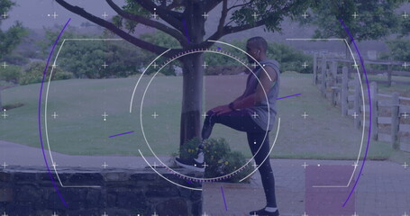 Image of circular scope processing over male athlete with prosthetic leg exercising outdoors