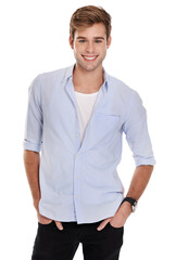 Fototapeta premium Man, shirt and fashion with studio portrait, smile and confidence with trendy style by white background. Person, model and jeans with clothes, happy or garments in casual outfit with pride in Sweden
