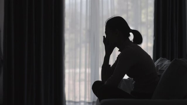 Shadow of a woman. She is depressed and depressed. There are problems. accumulated stress Relationship problems and emotional abuse.