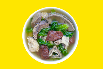 Bowl of pork blood soup on white background.