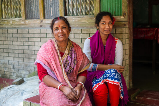 Portrait of south asian rural mother with her teenage daughter 