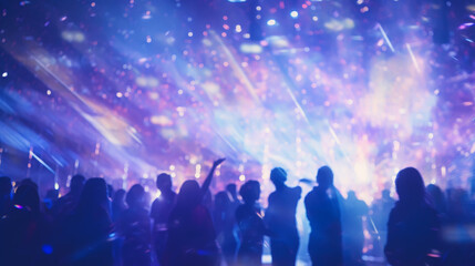 people having fun in a disco. blur effect for an artistic touch