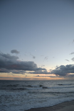 Clouds in a beach at sunset