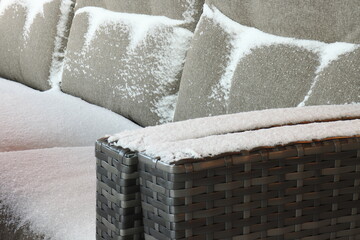Snow on garden furniture cushions made of waterproof and heat-resistant fabric