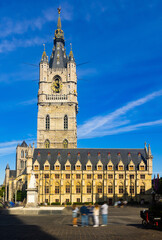 Fototapeta na wymiar Impressive view of medieval tower of Belfry of Ghent, the tallest belfry in Belgium