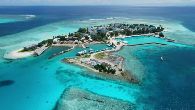 Gulhi island near Maafushi on Kaafu Atoll. Tropical Island with clear ocean and beach, Maldives. Aerial View