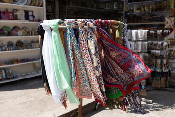 Traditional turkish Women Bright Painted Head Scarves For Dream Visit At Counter For Sale In Bazaar...