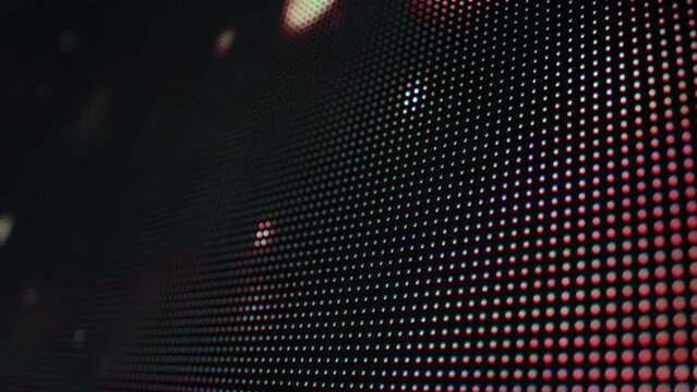 An RGB LED screen is a type of display that uses different LEDs to create a full spectrum of colors. Modern screen, background, macro