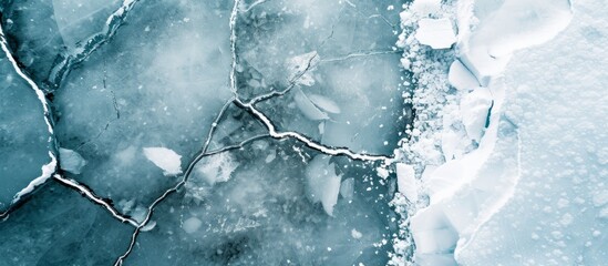 Cracks on frozen water, top view of ice floes in glacier and iceberg landscape, winter nature background.