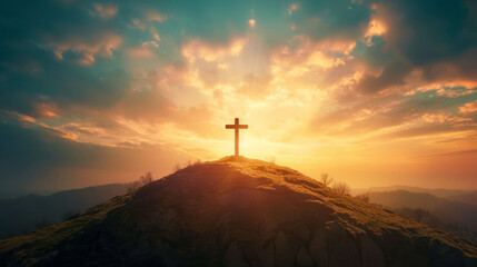 Holy cross on a hill against a bright sunset light background - obrazy, fototapety, plakaty