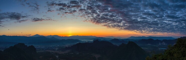 Fototapeta premium Panorama Picture at Sunrise View Point in Vang Vieng, Laos at Big Pha Ngern View Point Top. Sunning view early morning, view until Nam Ngum