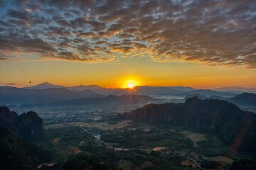 Obraz premium Sunrise View Point in Vang Vieng, Laos at Big Pha Ngern View Point Top. Sunning view early morning, view until Nam Ngum