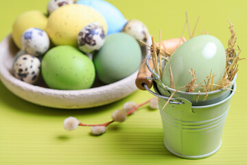 An Easter decoration with green eggs.
